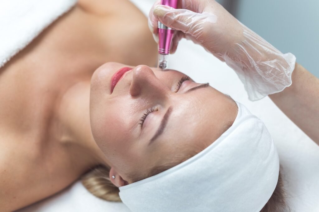 Woman having facial treatment in beauty salon, closeup. Oxy derma therapy